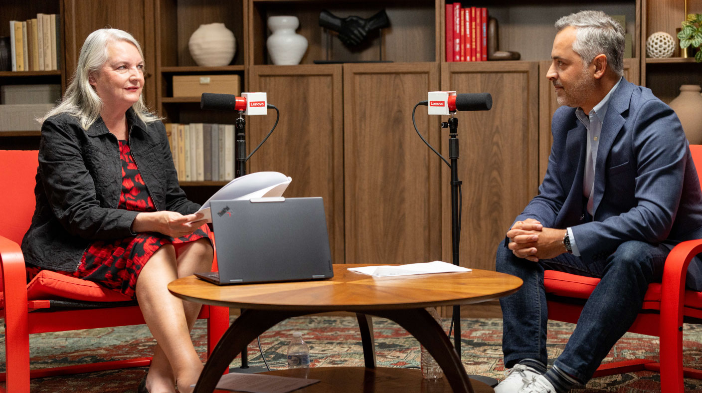 Cheryl McKinnon, principal analyst at Forrester Research, sits in front of a Lenovo ThinkPad X1 AI laptop as she interviews Tiago Silva, Lenovo’s Strategy & Planning Director and Chief of Staff of Digital Workplace Solutions in the Lenovo web studio.