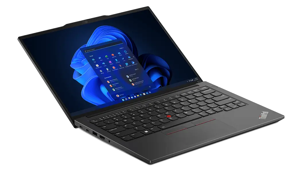 Lenovo ThinkPad E14 Gen 5 (14" AMD) laptop in Graphite Black – front-left view from above, lid open about 135 degrees, with Windows 11 menu on the display 