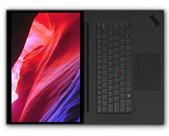 Vue aérienne de la station de travail portable Lenovo ThinkPad P1 Gen 6 (16 » Intel), ouvert à plat à 180 degrés, montrant le clavier et l’écran avec des formes rouges et bleues fluides à l’écran