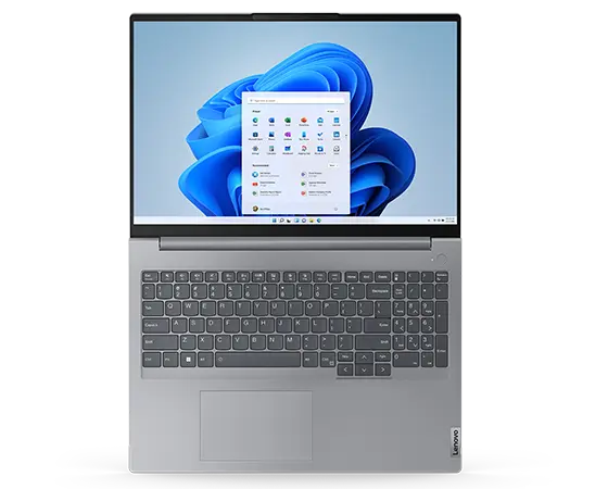 Vista superior del portátil Lenovo ThinkBook 16 de 6.ª generación abierto en un ángulo de 180 grados, mostrando la pantalla y el teclado.