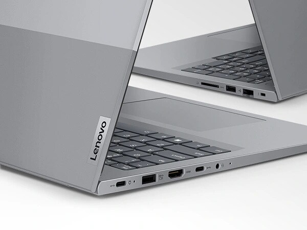 Two cropped & close up Lenovo ThinkBook 16 Gen 6 laptops with focus on dual-toned top cover & right- & left-side ports.