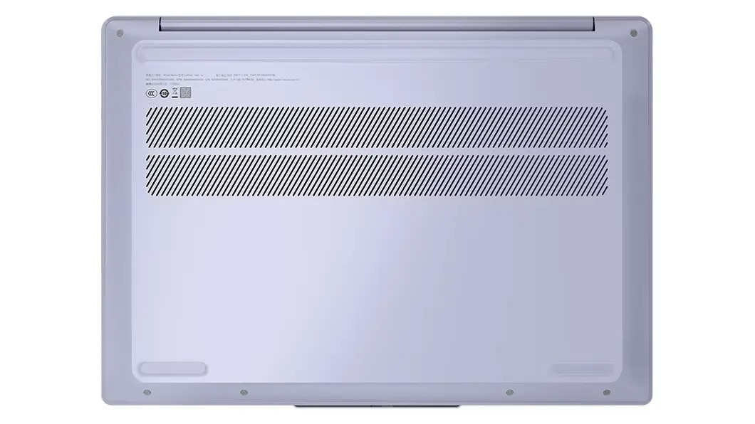 Centered overhead view of underside of 14-inch Lenovo IdeaPad Slim 5 Showing rubberized feet, cooling vents, and hinge.