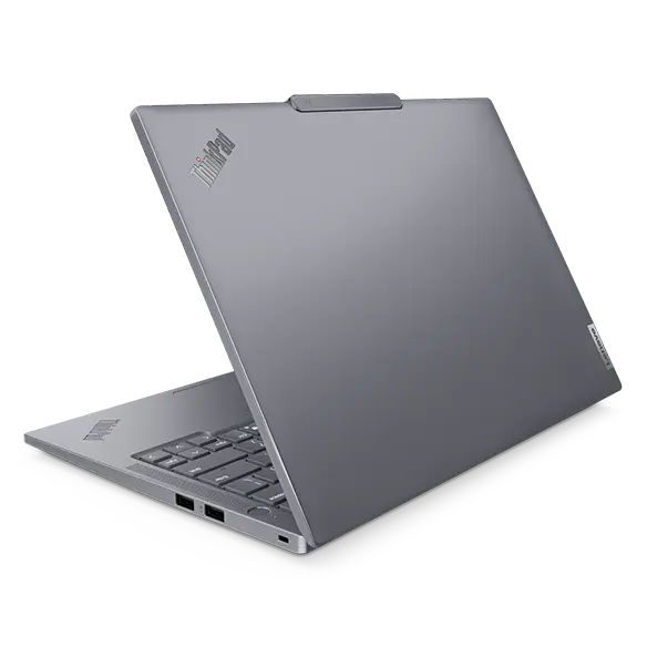 Rear, right side view of the Lenovo ThinkPad T14s Gen5 (14'' Intel) Luna Grey laptop opened at an acute angle, focusing its right side ports & aluminum-based top cover with visible ThinkPad logo.