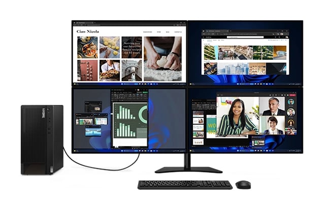 ThinkCentre M90t Gen 5 mit vier Monitoren, Tastatur und Maus, jeder Monitor zeigt eine andere Aufgabe an.