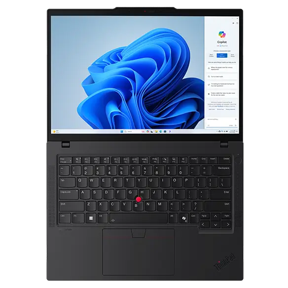 Overhead short of Lenovo ThinkPad T14 Gen 5 (14” AMD) Eclipse Black laptop with lid opened at 180 degrees, focusing its keyboard, touchpad, & display with Windows Copilot menu opened on the right of screen.