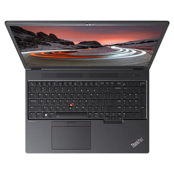 Aerial view of Lenovo ThinkPad P16v (16” AMD) mobile workstation, opened, showing full keyboard & display with Windows 11 start-up screen with a mountain image