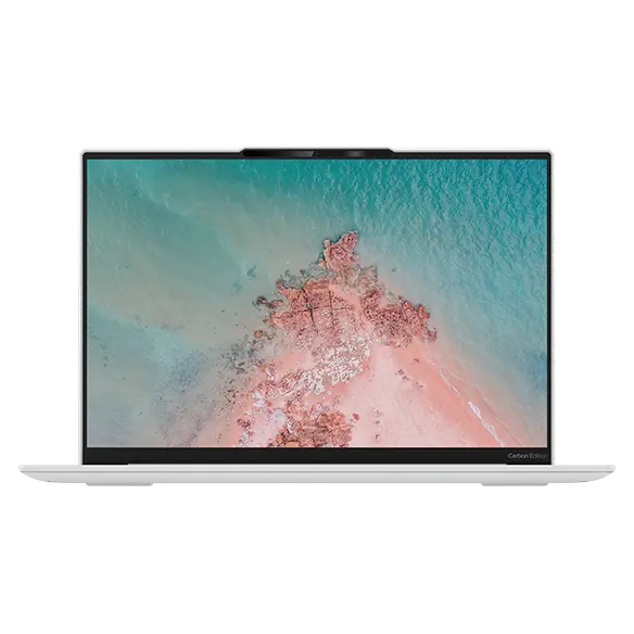 Forward-facing Yoga Slim 7i Carbon laptop, opened, showing keyboard edge & display with Windows 11 desktop wallpaper