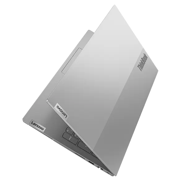 Overhead shot of Lenovo ThinkBook 15 Gen 5 laptop with focus on integrated fingerprint reader on power button.