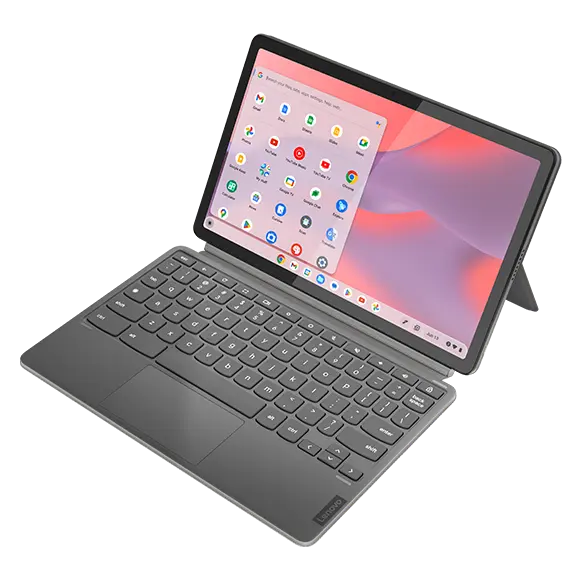 Angled top view of the Lenovo IdeaPad Duet 3 Chromebook (11" QCOM) in an open position. The device features a detachable keyboard and a touchscreen display with app icons on a pink and purple gradient background. The device is supported by its kickstand.