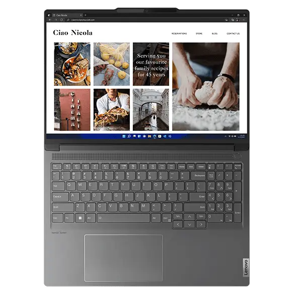 Overhead shot of the Lenovo ThinkBook 16p Gen 4 laptop open 180 degrees, showcasing 16 inch display & full-sized keyboard with numeric pad.