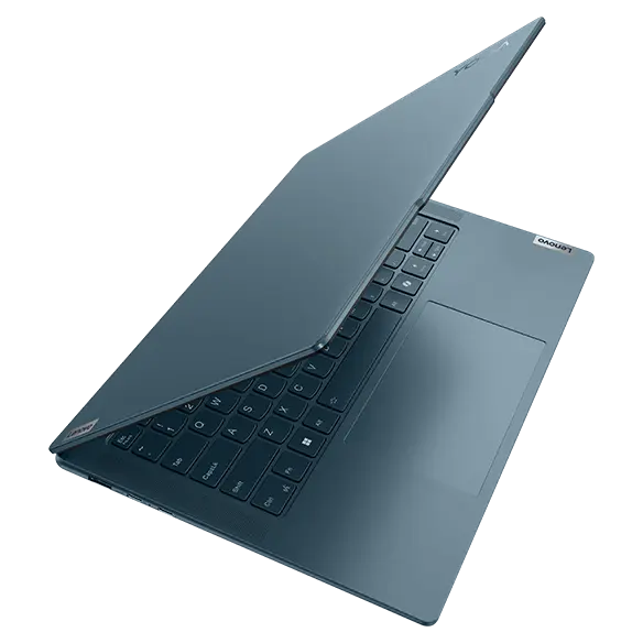 Right-side ports &  slots include the power button, a headphone / mic combo jack & a powered USB-A port on the Lenovo Yoga Pro 7i Gen 9 laptop.