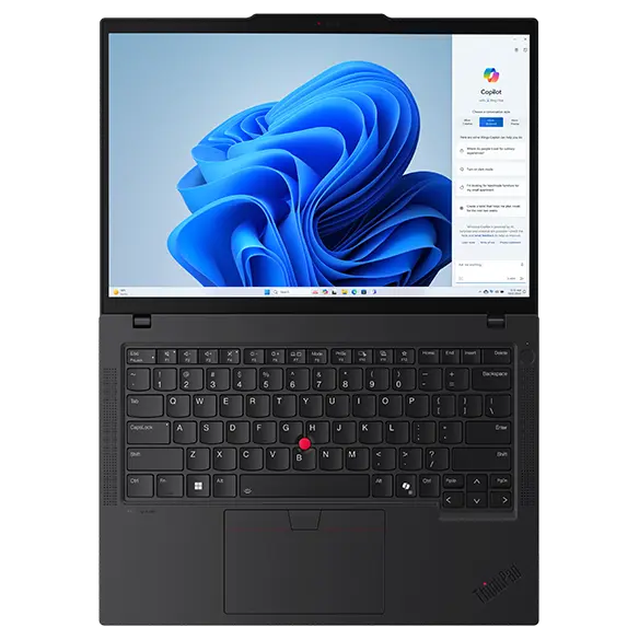 Overhead short of Lenovo ThinkPad T14 Gen 5 (14” AMD) Eclipse Black laptop with lid opened at 180 degrees, focusing its keyboard, touchpad, & display with Windows Copilot menu opened on the right of screen.