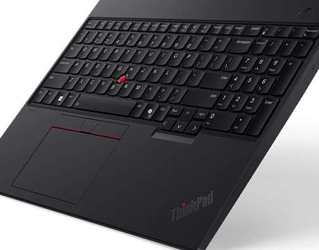 Lenovo ThinkPad T16 Gen 4 (16" Intel) laptop – right-front view, angled upward from front edge, close-up of keyboard 