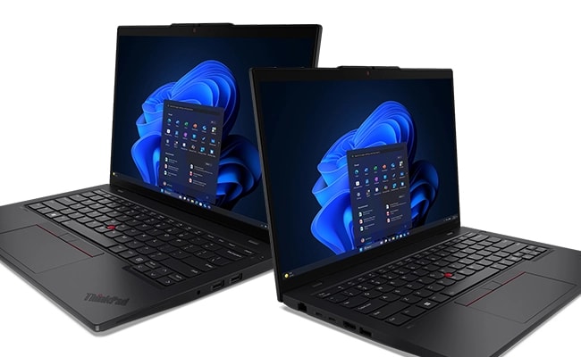 Two Lenovo ThinkPad L14 Gen 6 (14" Intel) laptops – right-front and left-front views, lids open, with Windows 11 menu in front of Windows bloom background on the diTwo Lenovo ThinkPad L14 Gen 6 (14" Intel) laptops – right-front and left-front views, lids open, with Windows 11 menu in front of Windows bloom background on the di