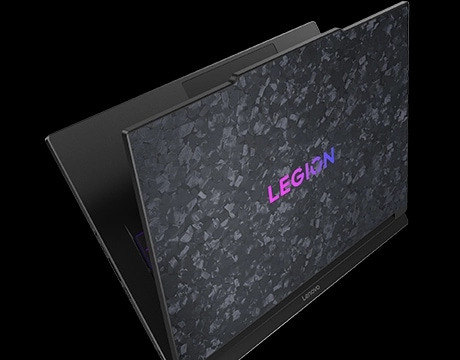 Legion 9i powering video editing workflow with ultra-wide display in a high-end creative setup.