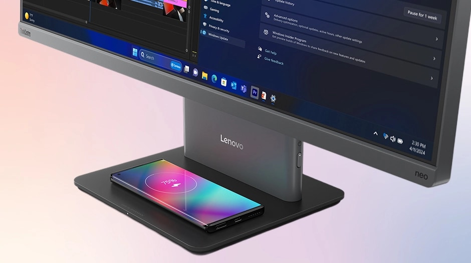 Optional wireless charging pad in the stand of Lenovo ThinkCentre Neo 50a Gen 6 (27" Intel) AIO desktop powers a phone, seamlessly.