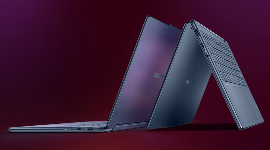 Lenovo YOGA 9i 2-in-1 Gen 11 Aura Edition laptops in a triangular formation, showcasing sleek design and dark finish. מחשב נייד Yoga 9 2-in-1 Aura Edition 14IPH11 83SE001MIV מבית Lenovo