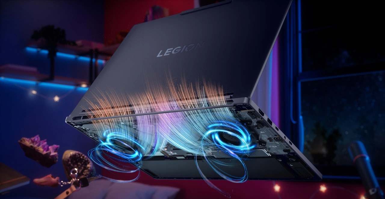 Underside view of Lenovo Legion laptop with dynamic blue and orange airflow effects, showcasing cooling.