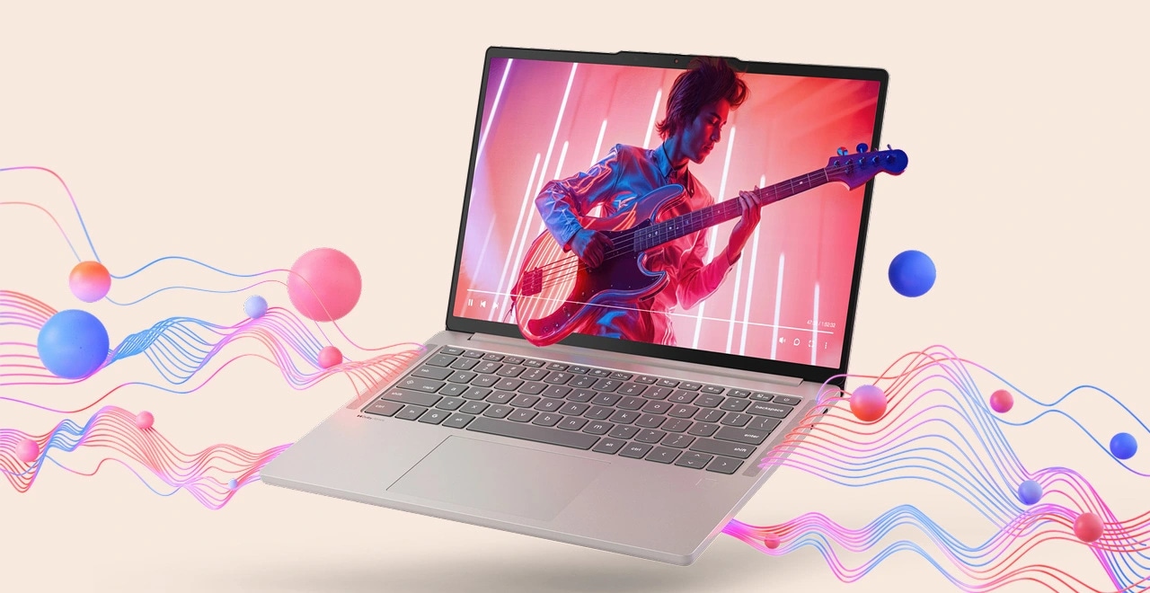 Een video van een muzikant die basgitaar speelt op het scherm, met kleurrijke golflintjes die rond de Lenovo Chromebook Plus zweven en een meeslepende audio-gebruikerservaring bieden.