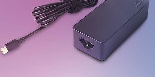 A ThinkCentre 65W AC Adapter is featured on a background.