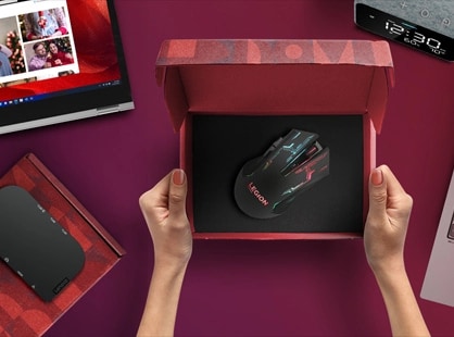 Two opened Lenovo Laptops, Legion Mouse in a gift box and smart clock.