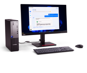 Lenovo desktop computer setup with a tower, widescreen monitor displaying a chat interface, black keyboard, and mouse on a purple background.