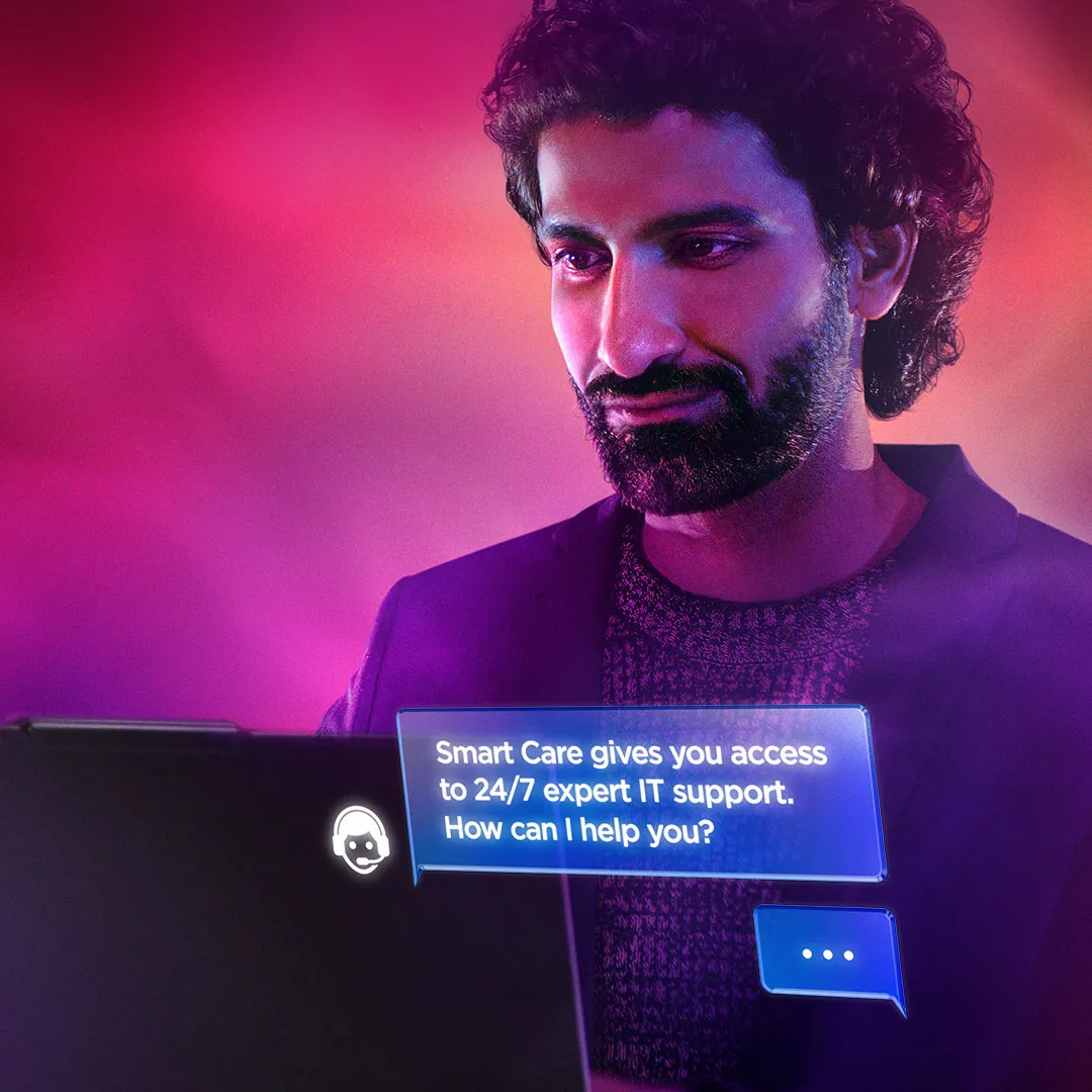 A man using a laptop to contact Smart Care
