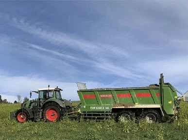 Tractor harvesting in a field