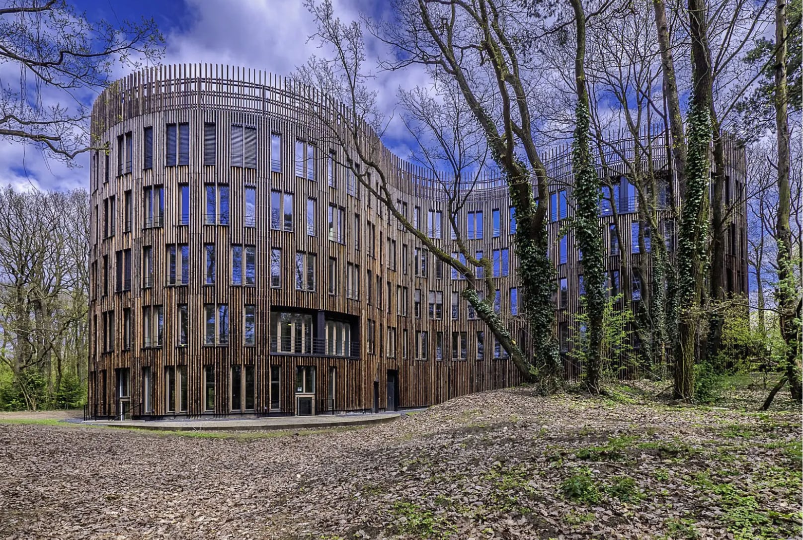 A five-story building that looks like it is made of sticks