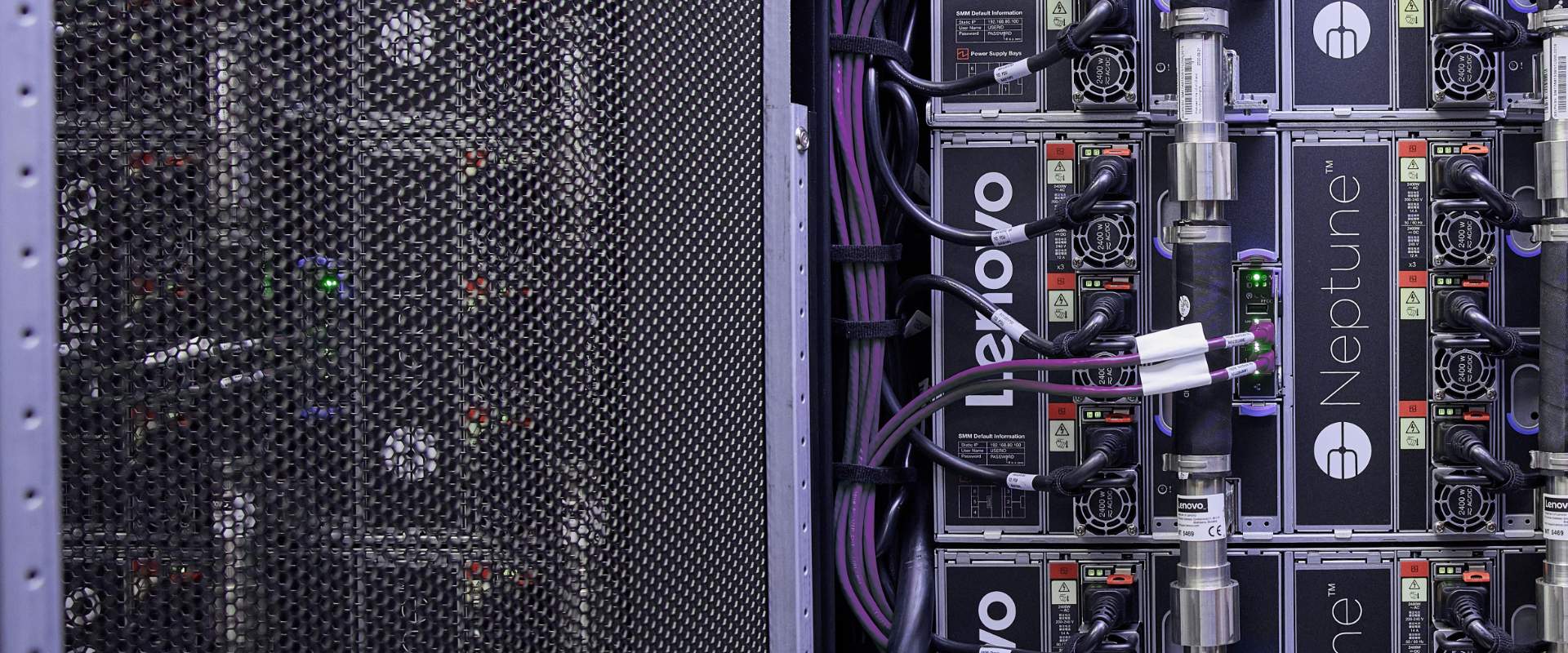 Close-up of Lenovo Neptune server components and cables.