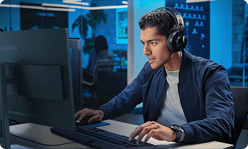 A lifestyle photo shows a man using the legion 27-10 monitor with less eyes strain.