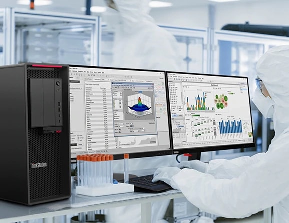 Tour Lenovo ThinkStation P620 utilisée dans un laboratoire avec deux moniteurs indépendants.