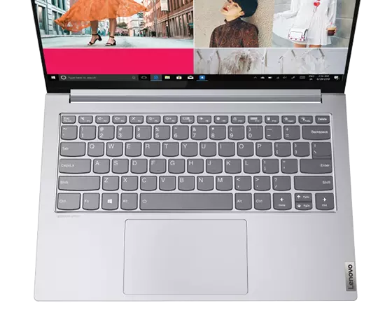 Silver Lenovo Yoga Slim 7 Pro 14 overhead view showing keyboard and part of display