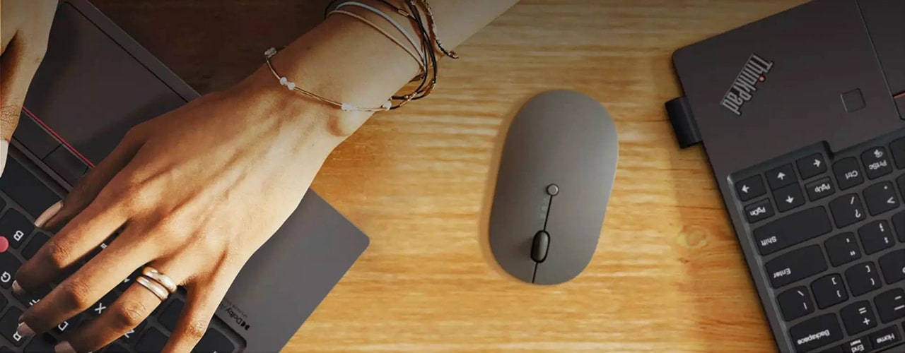 Lenovo Go Wireless Multi-Device Mouse connected to three separate devices