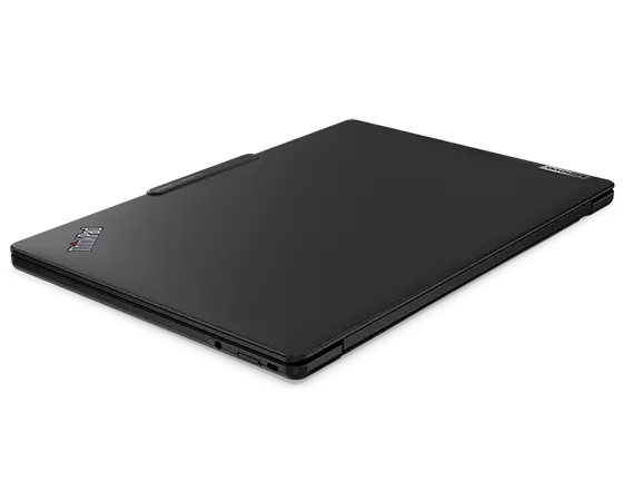 Closed cover on the Lenovo ThinkPad X13s laptop,  angled to show left-side ports.