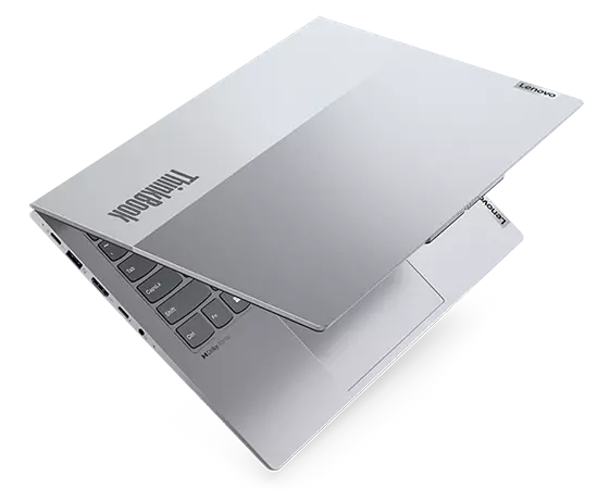 Top cover of Lenovo ThinkBook 14 Gen 4+ laptop showcasing dual-tone Arctic Grey color.