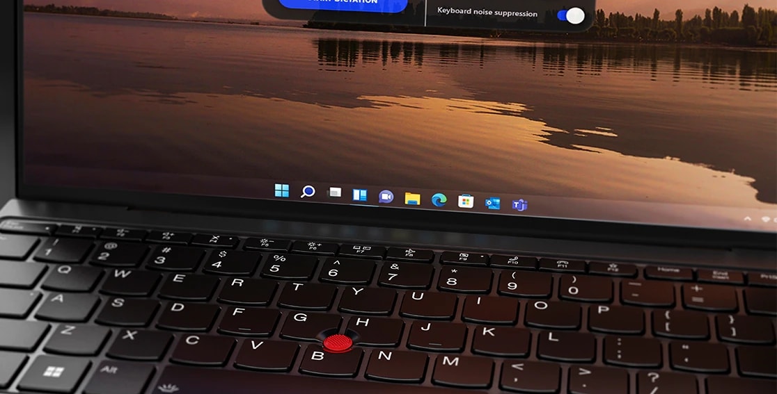 Close-up of keyboard & dual-purpose TrackPoint on the Lenovo ThinkPad Z13 laptop.