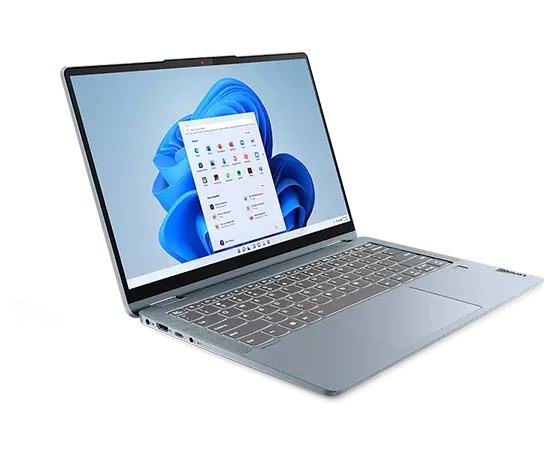 Front-left angle view of a stone blue 14” IdeaPad Flex 5i, showing the keyboard, touchpad, left-side ports, and display, which depicts an OS panel against a swirling blue shape