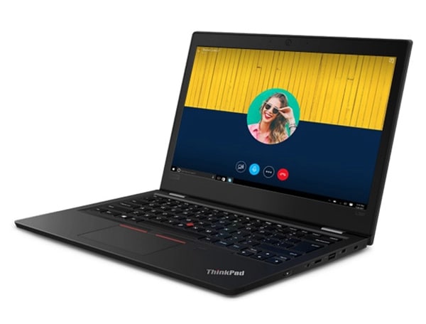Lenovo ThinkPad L390 - Business laptop open, revealing a video call taking place