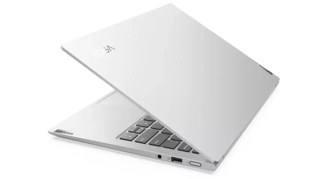 image of Lenovo Yoga Slim 7i Pro 14 silver laptop side view with lid partially closed