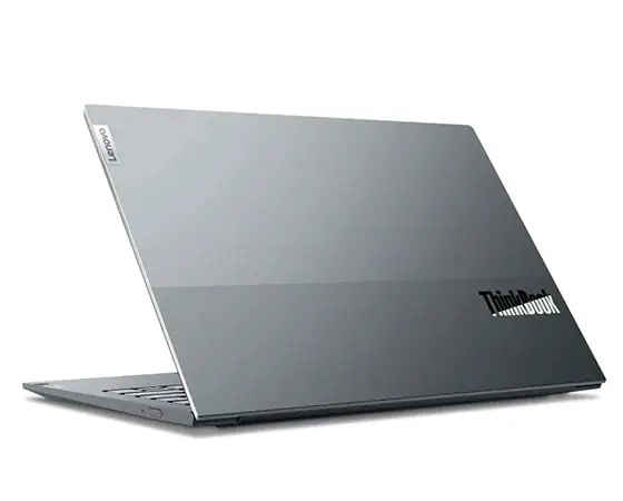 Vue arrière droite d'un ordinateur portable Lenovo ThinkBook 13x à hauteur des yeux, avec capot supérieur bicolore Storm Gray ouvert à 75 degrés, affichant le logo distinctif ThinkBook.