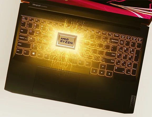 Lenovo IdeaPad Gaming 3 Gen 6 (15, AMD) laptop, top view showing keyboard and an AMD Ryzen logo surrounded by light effects