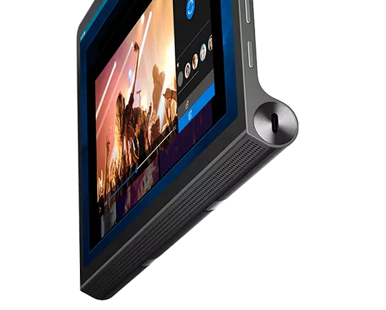 Lenovo Yoga Tab 11 vue recadrée sur tablette du côté droit, du bas et de l’avant, en se concentrant sur les haut-parleurs, avec lecteur de musique et image de concert sur l’écran