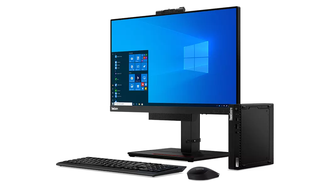 Lenovo ThinkCentre M75q Gen 2 posé à côté d’un moniteur, d’un clavier et d’une souris