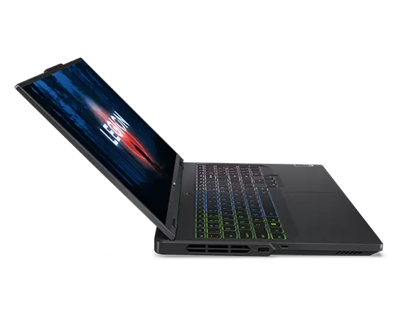 Legion 5 Pro Gen 8 (16″ AMD) öppnad och liggande platt åt höger med skärmen på och RGB-tangentbordsbelysningen på