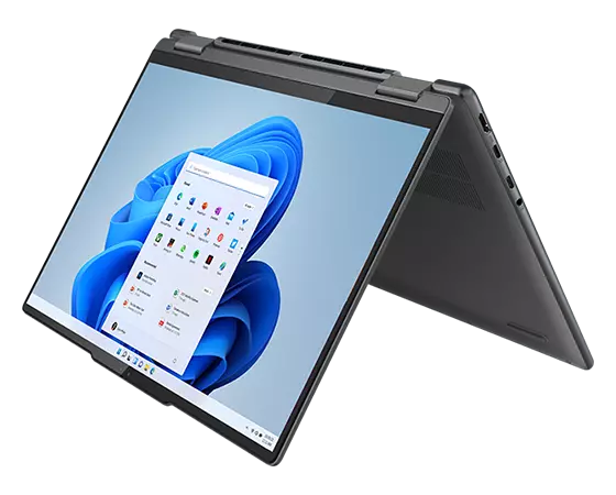Yoga 9i 2-in-1 laptop in tent mode, showing silver graphic resembling mercury on the display and a stylus suspended in air, touching the display